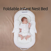 A portable bed for a newborn made of breathable fabric