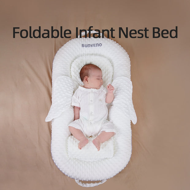 A portable bed for a newborn made of breathable fabric