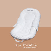 A portable bed for a newborn made of breathable fabric