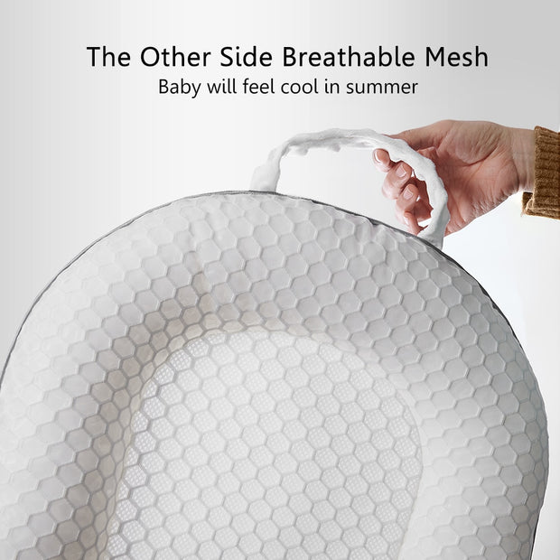 A portable bed for a newborn made of breathable fabric